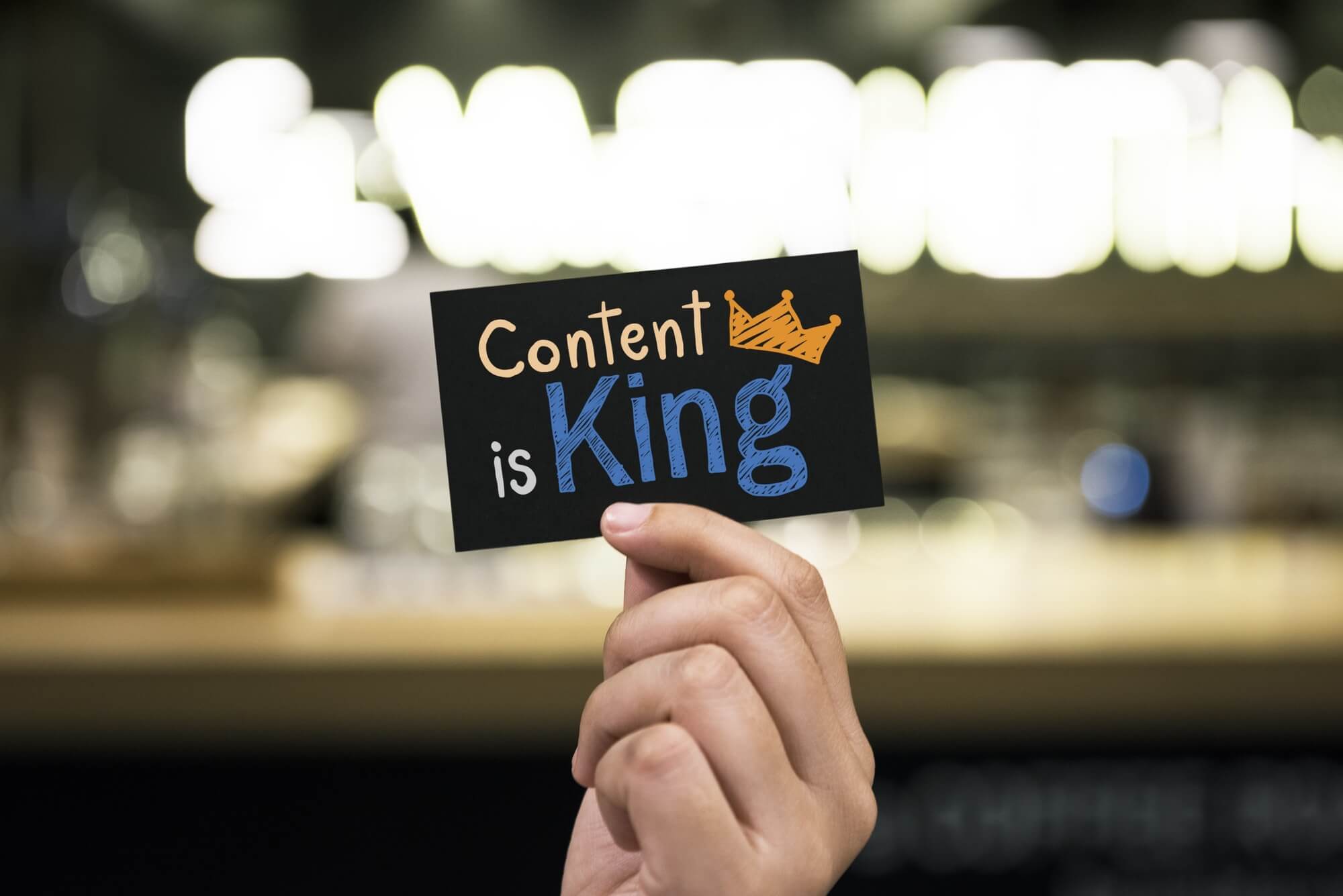 hand met kaartje: content is king